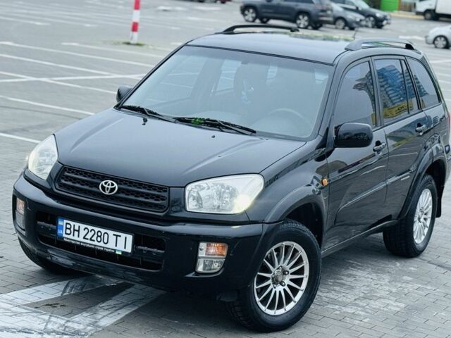 Черный Тойота РАВ 4, объемом двигателя 2 л и пробегом 205 тыс. км за 5900 $, фото 3 на Automoto.ua
