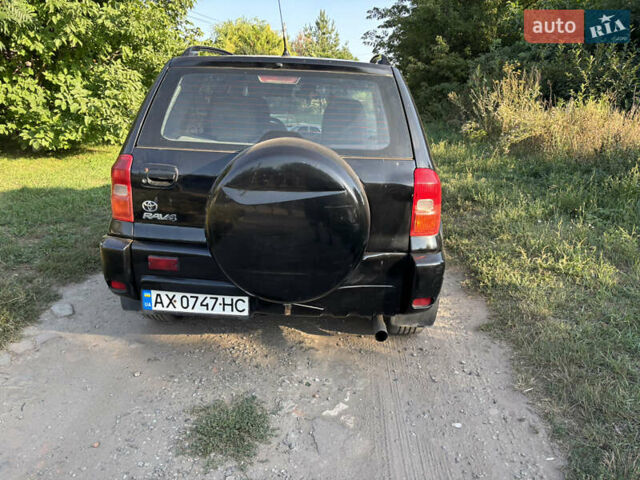 Черный Тойота РАВ 4, объемом двигателя 2 л и пробегом 493 тыс. км за 5500 $, фото 2 на Automoto.ua