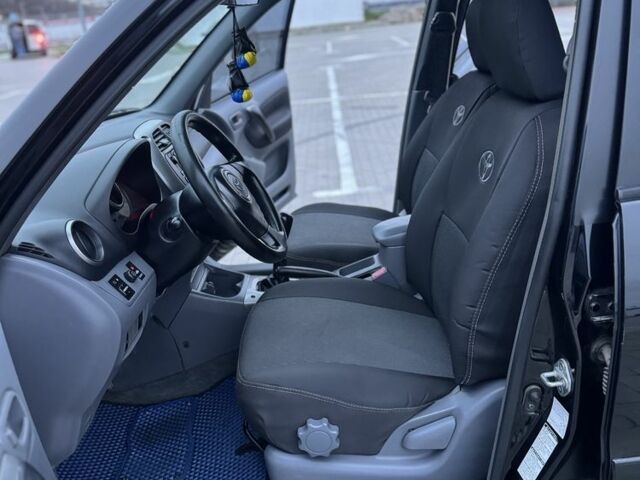 Черный Тойота РАВ 4, объемом двигателя 2 л и пробегом 205 тыс. км за 5900 $, фото 19 на Automoto.ua