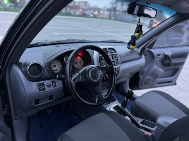 Черный Тойота РАВ 4, объемом двигателя 2 л и пробегом 205 тыс. км за 5900 $, фото 23 на Automoto.ua