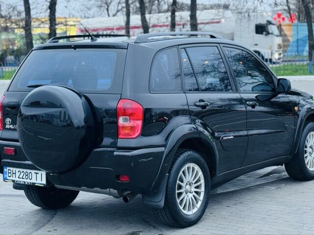 Черный Тойота РАВ 4, объемом двигателя 2 л и пробегом 205 тыс. км за 5900 $, фото 14 на Automoto.ua