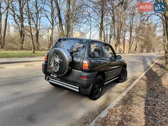 Черный Тойота РАВ 4, объемом двигателя 2 л и пробегом 250 тыс. км за 5490 $, фото 19 на Automoto.ua