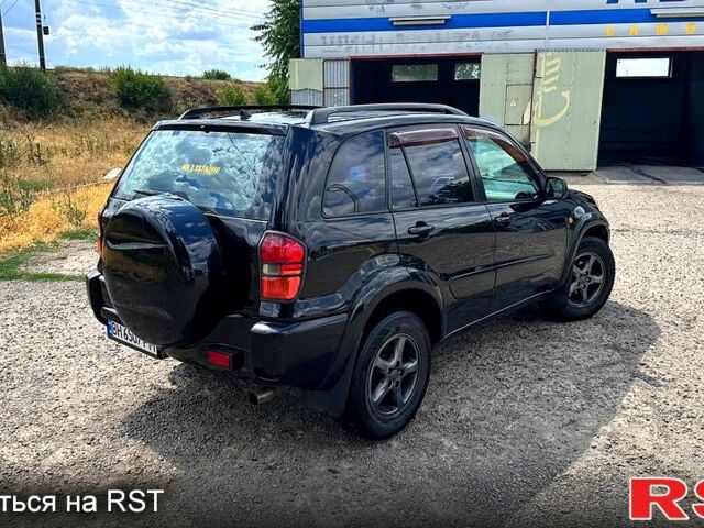 Черный Тойота РАВ 4, объемом двигателя 2 л и пробегом 250 тыс. км за 4650 $, фото 4 на Automoto.ua
