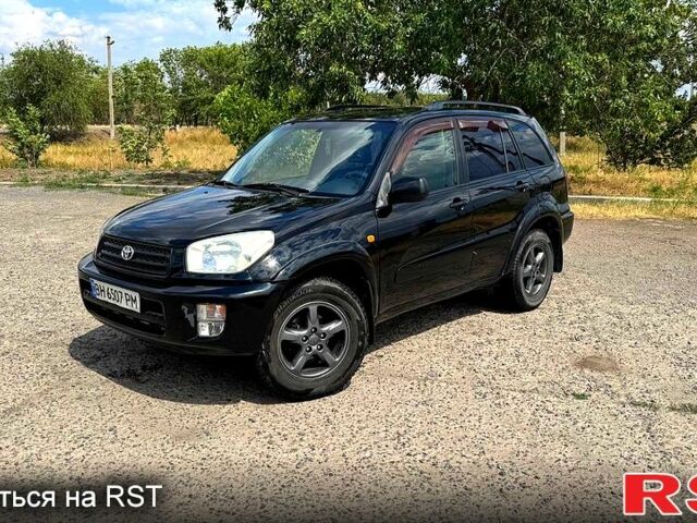 Черный Тойота РАВ 4, объемом двигателя 2 л и пробегом 250 тыс. км за 4650 $, фото 1 на Automoto.ua