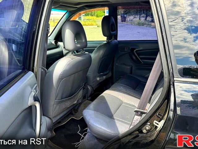Черный Тойота РАВ 4, объемом двигателя 2 л и пробегом 250 тыс. км за 4650 $, фото 6 на Automoto.ua