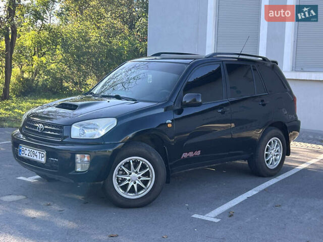Чорний Тойота РАВ 4, об'ємом двигуна 2 л та пробігом 287 тис. км за 5900 $, фото 4 на Automoto.ua