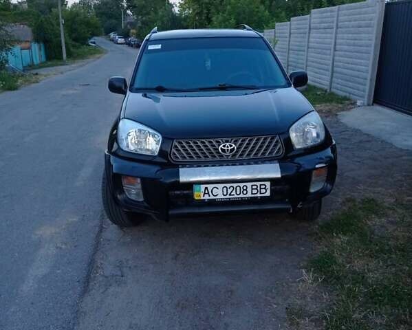 Чорний Тойота РАВ 4, об'ємом двигуна 2 л та пробігом 201 тис. км за 4550 $, фото 1 на Automoto.ua