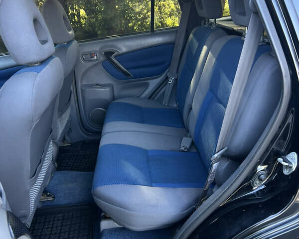 Чорний Тойота РАВ 4, об'ємом двигуна 2 л та пробігом 287 тис. км за 5900 $, фото 23 на Automoto.ua
