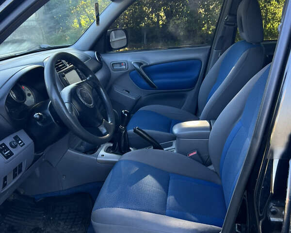 Чорний Тойота РАВ 4, об'ємом двигуна 2 л та пробігом 287 тис. км за 5900 $, фото 21 на Automoto.ua