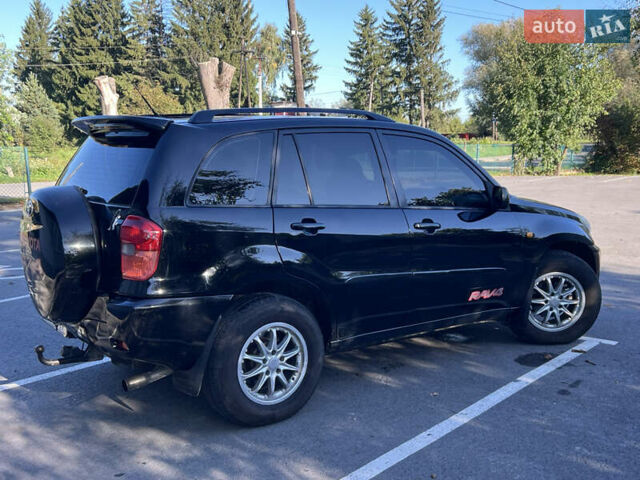 Чорний Тойота РАВ 4, об'ємом двигуна 2 л та пробігом 287 тис. км за 5900 $, фото 18 на Automoto.ua