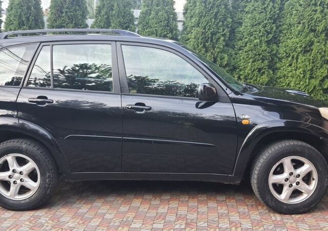 Чорний Тойота РАВ 4, об'ємом двигуна 2 л та пробігом 270 тис. км за 5800 $, фото 3 на Automoto.ua