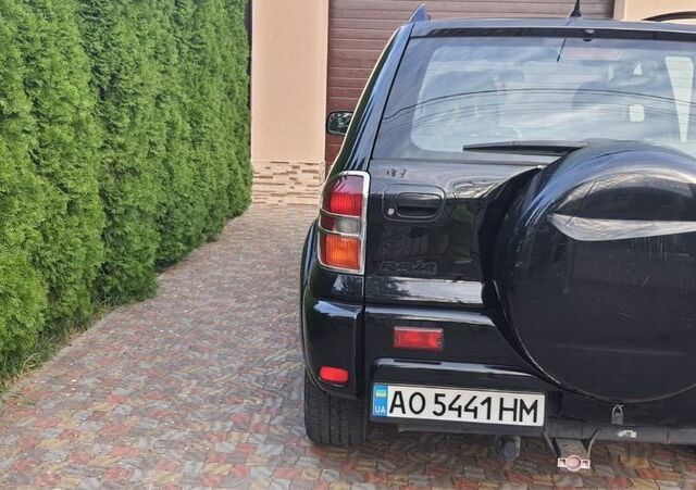 Чорний Тойота РАВ 4, об'ємом двигуна 2 л та пробігом 270 тис. км за 5800 $, фото 2 на Automoto.ua