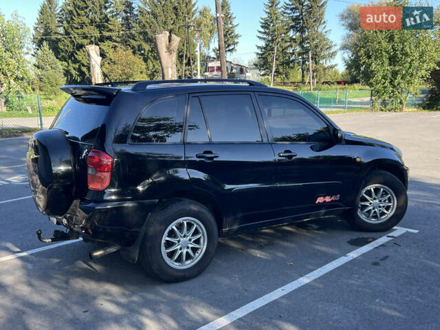 Чорний Тойота РАВ 4, об'ємом двигуна 2 л та пробігом 287 тис. км за 5900 $, фото 19 на Automoto.ua