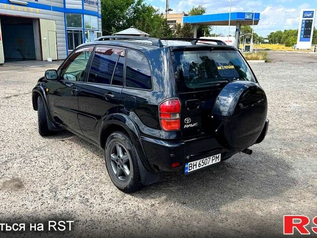 Черный Тойота РАВ 4, объемом двигателя 2 л и пробегом 250 тыс. км за 4650 $, фото 3 на Automoto.ua