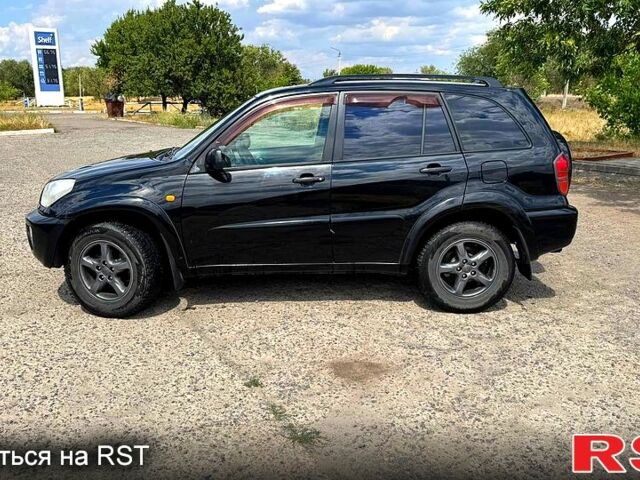 Черный Тойота РАВ 4, объемом двигателя 2 л и пробегом 250 тыс. км за 4650 $, фото 2 на Automoto.ua