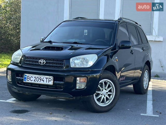 Чорний Тойота РАВ 4, об'ємом двигуна 2 л та пробігом 287 тис. км за 5900 $, фото 1 на Automoto.ua