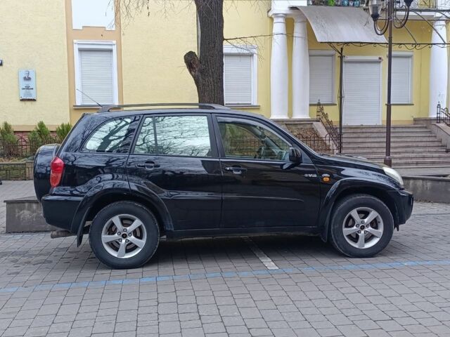 Черный Тойота РАВ 4, объемом двигателя 2 л и пробегом 303 тыс. км за 3800 $, фото 4 на Automoto.ua