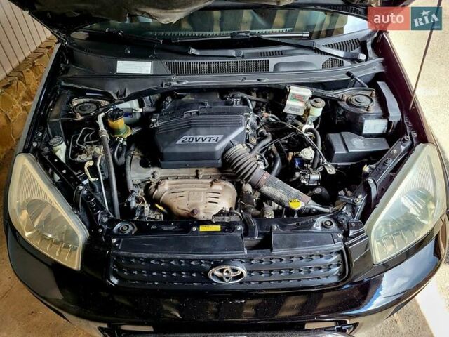 Черный Тойота РАВ 4, объемом двигателя 2 л и пробегом 245 тыс. км за 6800 $, фото 13 на Automoto.ua