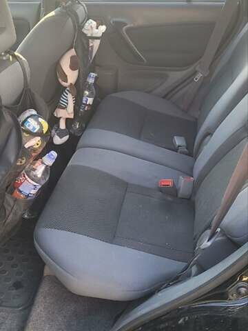 Черный Тойота РАВ 4, объемом двигателя 2 л и пробегом 268 тыс. км за 6500 $, фото 5 на Automoto.ua