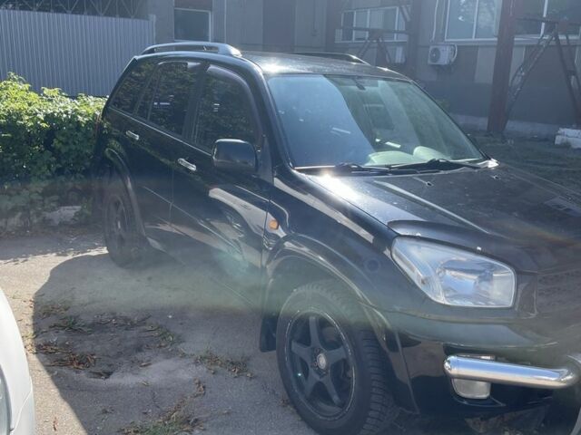 Чорний Тойота РАВ 4, об'ємом двигуна 2 л та пробігом 3 тис. км за 6000 $, фото 2 на Automoto.ua