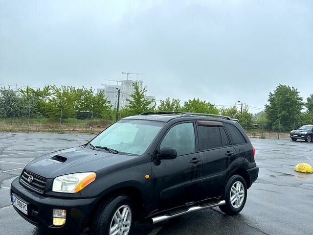 Черный Тойота РАВ 4, объемом двигателя 2 л и пробегом 225 тыс. км за 6350 $, фото 6 на Automoto.ua