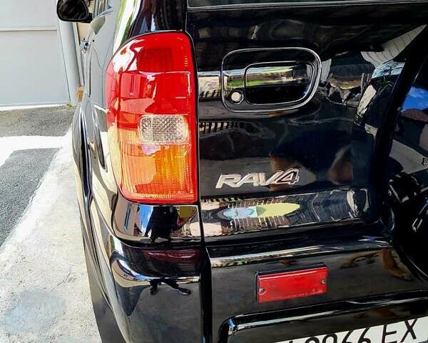 Черный Тойота РАВ 4, объемом двигателя 2 л и пробегом 245 тыс. км за 6800 $, фото 9 на Automoto.ua