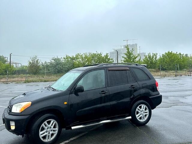 Черный Тойота РАВ 4, объемом двигателя 2 л и пробегом 225 тыс. км за 6350 $, фото 4 на Automoto.ua