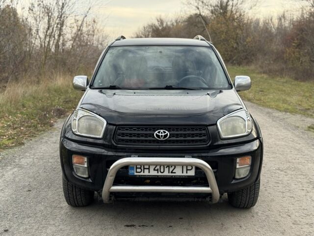 Черный Тойота РАВ 4, объемом двигателя 2 л и пробегом 235 тыс. км за 4500 $, фото 2 на Automoto.ua