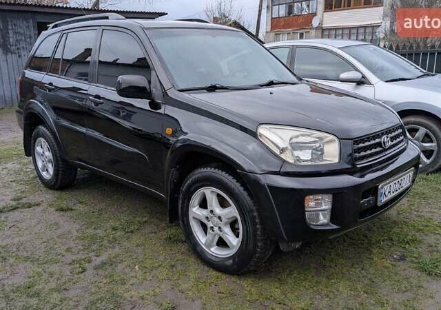Черный Тойота РАВ 4, объемом двигателя 2 л и пробегом 406 тыс. км за 6000 $, фото 3 на Automoto.ua