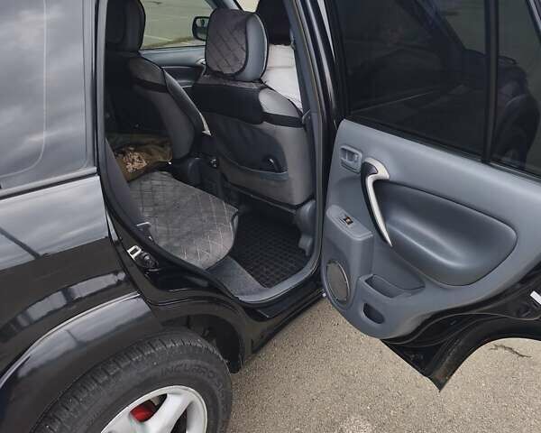 Чорний Тойота РАВ 4, об'ємом двигуна 2 л та пробігом 270 тис. км за 6500 $, фото 8 на Automoto.ua