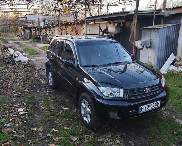Чорний Тойота РАВ 4, об'ємом двигуна 2 л та пробігом 270 тис. км за 6500 $, фото 1 на Automoto.ua