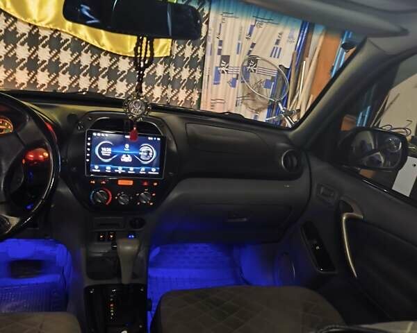 Чорний Тойота РАВ 4, об'ємом двигуна 2 л та пробігом 270 тис. км за 6500 $, фото 13 на Automoto.ua