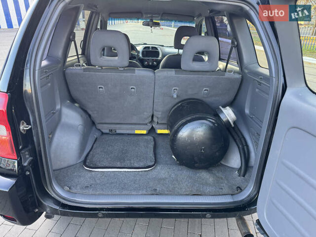 Черный Тойота РАВ 4, объемом двигателя 2 л и пробегом 479 тыс. км за 6000 $, фото 8 на Automoto.ua