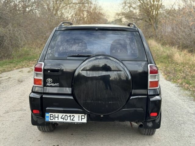 Черный Тойота РАВ 4, объемом двигателя 2 л и пробегом 235 тыс. км за 4500 $, фото 4 на Automoto.ua