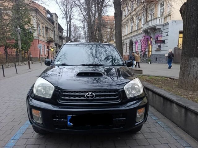 Черный Тойота РАВ 4, объемом двигателя 2 л и пробегом 303 тыс. км за 3800 $, фото 1 на Automoto.ua