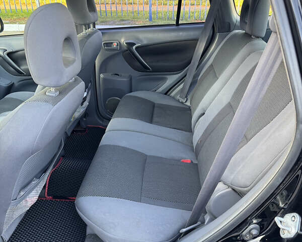 Черный Тойота РАВ 4, объемом двигателя 2 л и пробегом 479 тыс. км за 6000 $, фото 9 на Automoto.ua