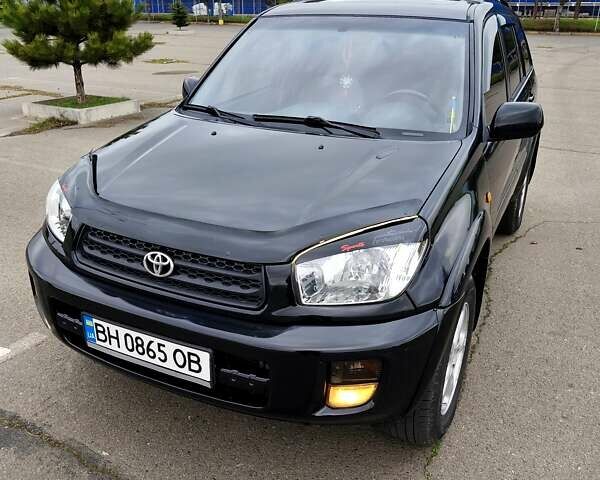 Чорний Тойота РАВ 4, об'ємом двигуна 2 л та пробігом 270 тис. км за 6500 $, фото 2 на Automoto.ua