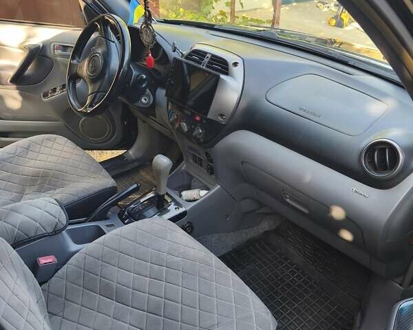 Чорний Тойота РАВ 4, об'ємом двигуна 2 л та пробігом 270 тис. км за 6500 $, фото 16 на Automoto.ua