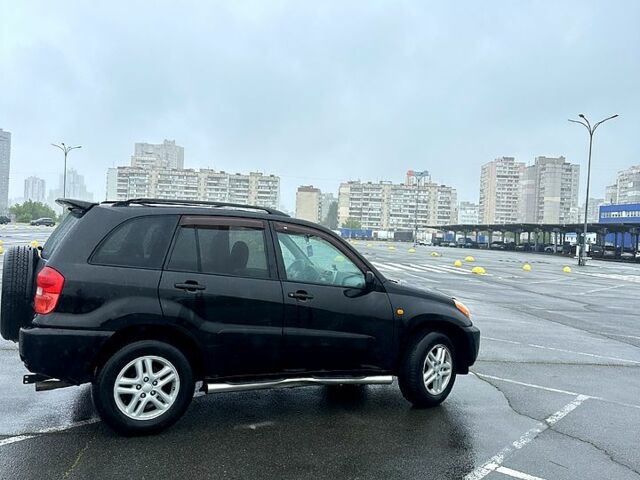 Черный Тойота РАВ 4, объемом двигателя 2 л и пробегом 225 тыс. км за 6350 $, фото 8 на Automoto.ua