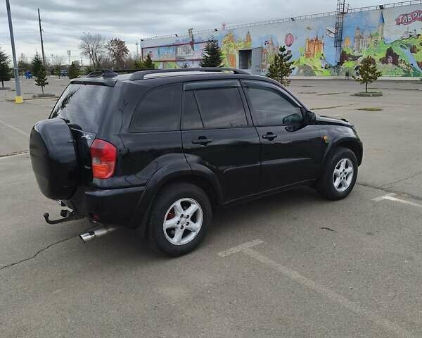 Чорний Тойота РАВ 4, об'ємом двигуна 2 л та пробігом 270 тис. км за 6500 $, фото 4 на Automoto.ua