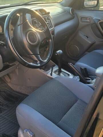 Черный Тойота РАВ 4, объемом двигателя 2 л и пробегом 268 тыс. км за 6500 $, фото 4 на Automoto.ua