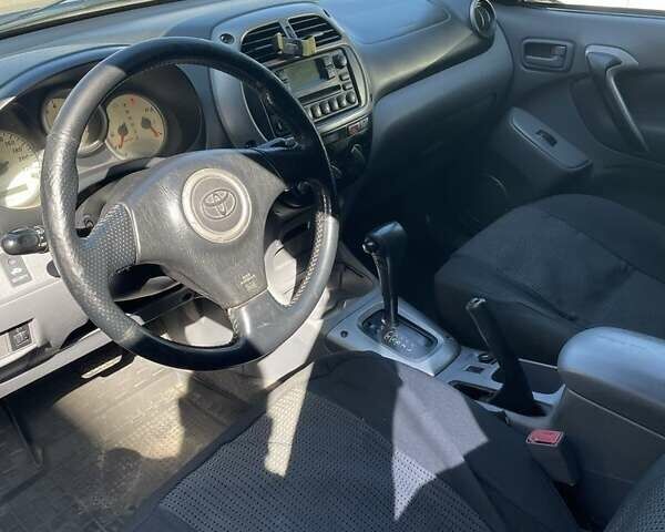 Черный Тойота РАВ 4, объемом двигателя 2 л и пробегом 360 тыс. км за 6000 $, фото 2 на Automoto.ua