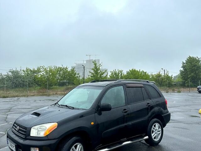 Черный Тойота РАВ 4, объемом двигателя 2 л и пробегом 225 тыс. км за 6350 $, фото 3 на Automoto.ua