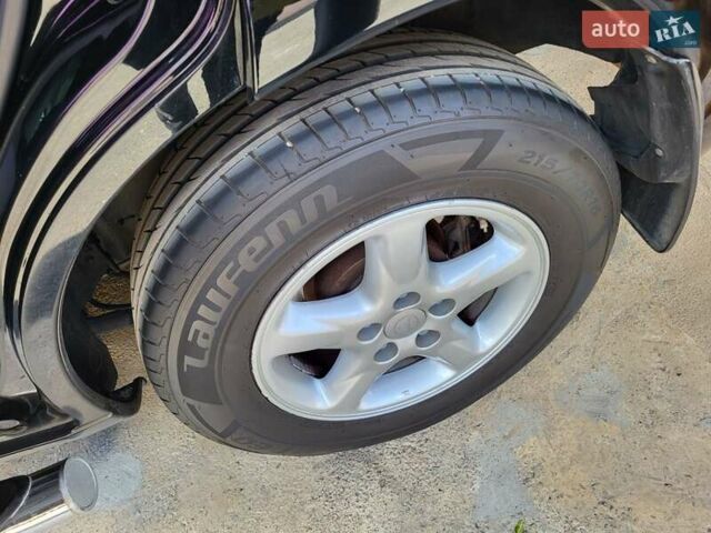 Черный Тойота РАВ 4, объемом двигателя 2 л и пробегом 245 тыс. км за 6800 $, фото 7 на Automoto.ua