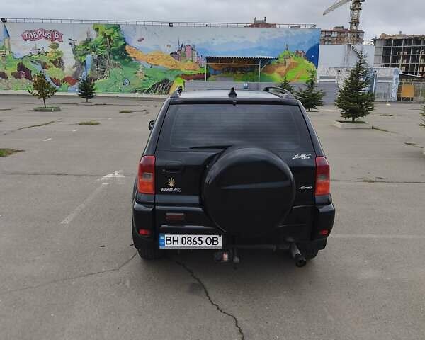 Чорний Тойота РАВ 4, об'ємом двигуна 2 л та пробігом 270 тис. км за 6500 $, фото 5 на Automoto.ua