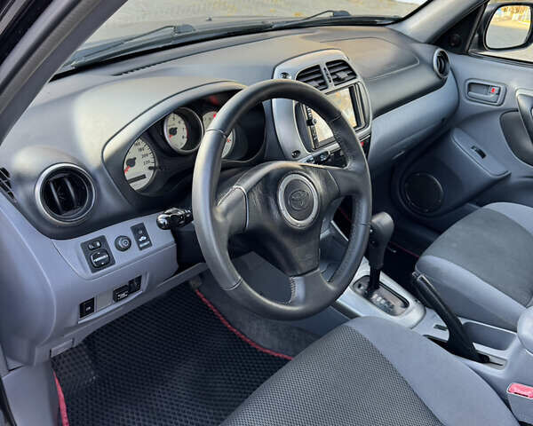 Черный Тойота РАВ 4, объемом двигателя 2 л и пробегом 479 тыс. км за 6000 $, фото 6 на Automoto.ua