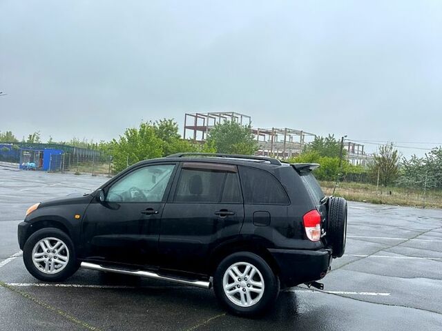 Черный Тойота РАВ 4, объемом двигателя 2 л и пробегом 225 тыс. км за 6350 $, фото 5 на Automoto.ua