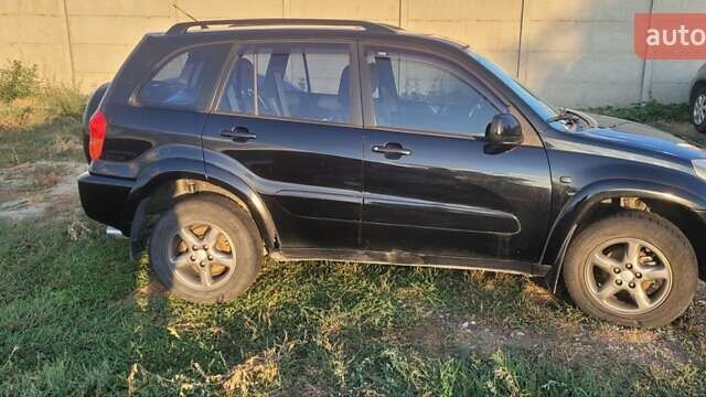 Черный Тойота РАВ 4, объемом двигателя 2 л и пробегом 268 тыс. км за 6500 $, фото 9 на Automoto.ua