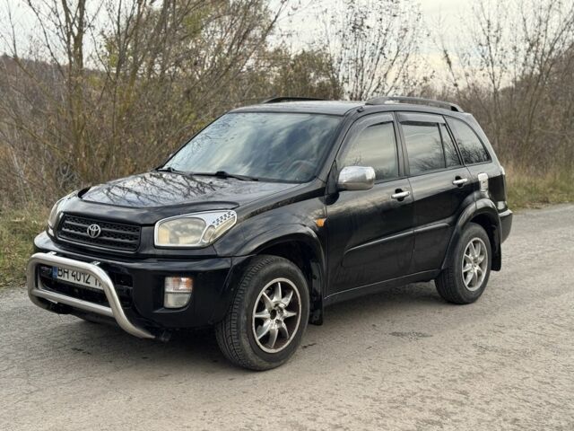 Черный Тойота РАВ 4, объемом двигателя 2 л и пробегом 235 тыс. км за 4500 $, фото 1 на Automoto.ua