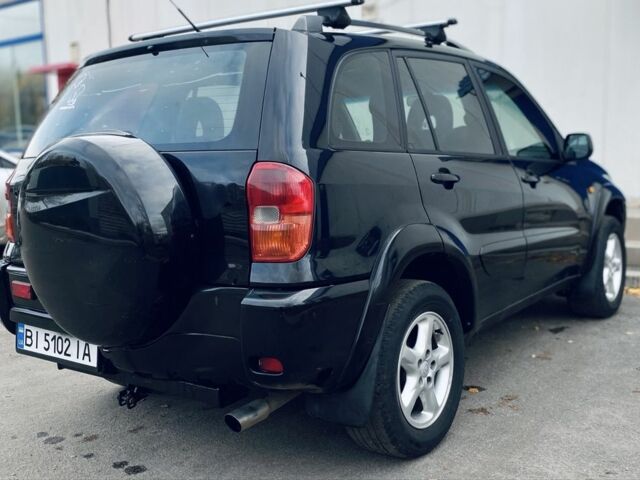 Черный Тойота РАВ 4, объемом двигателя 2 л и пробегом 30 тыс. км за 5000 $, фото 1 на Automoto.ua